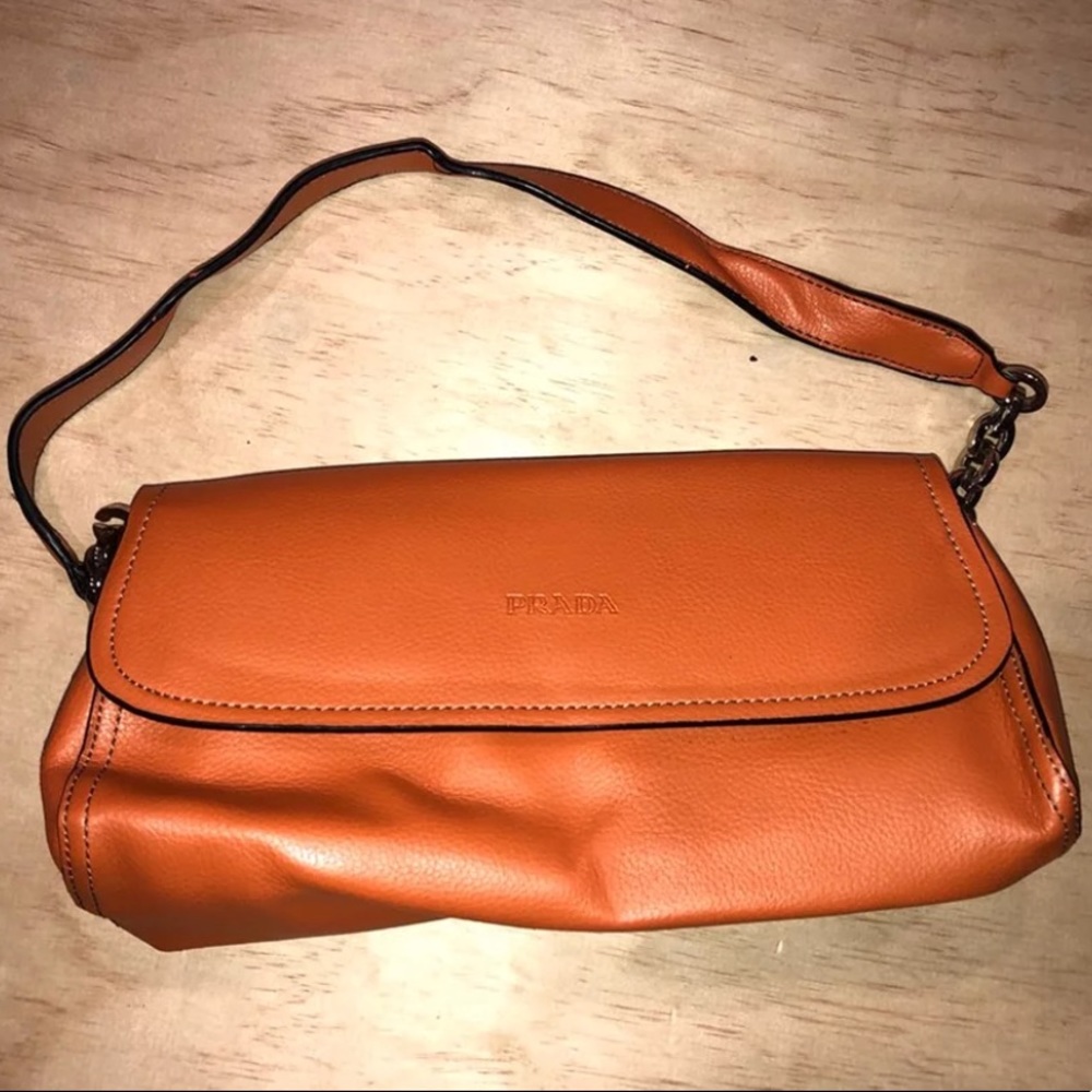 Orange leather Prada purse